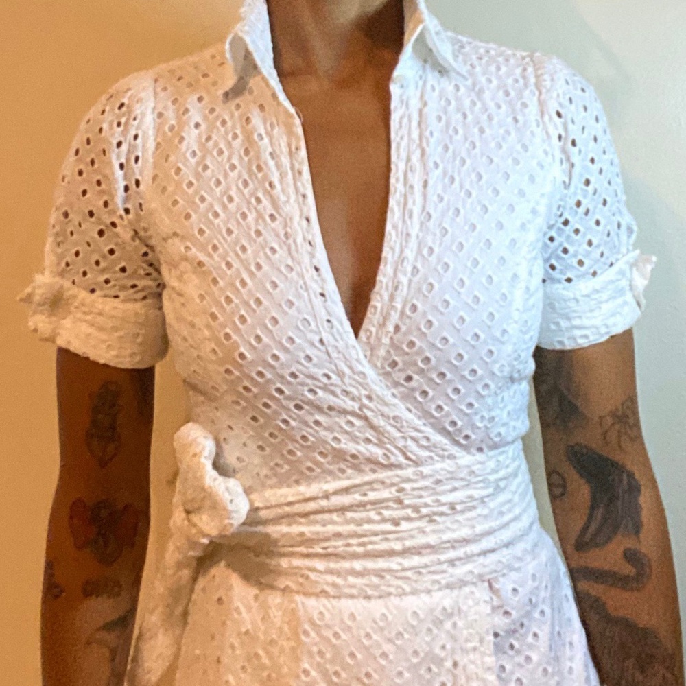 Diane Von Furstenberg white 100% cotton wrap top.